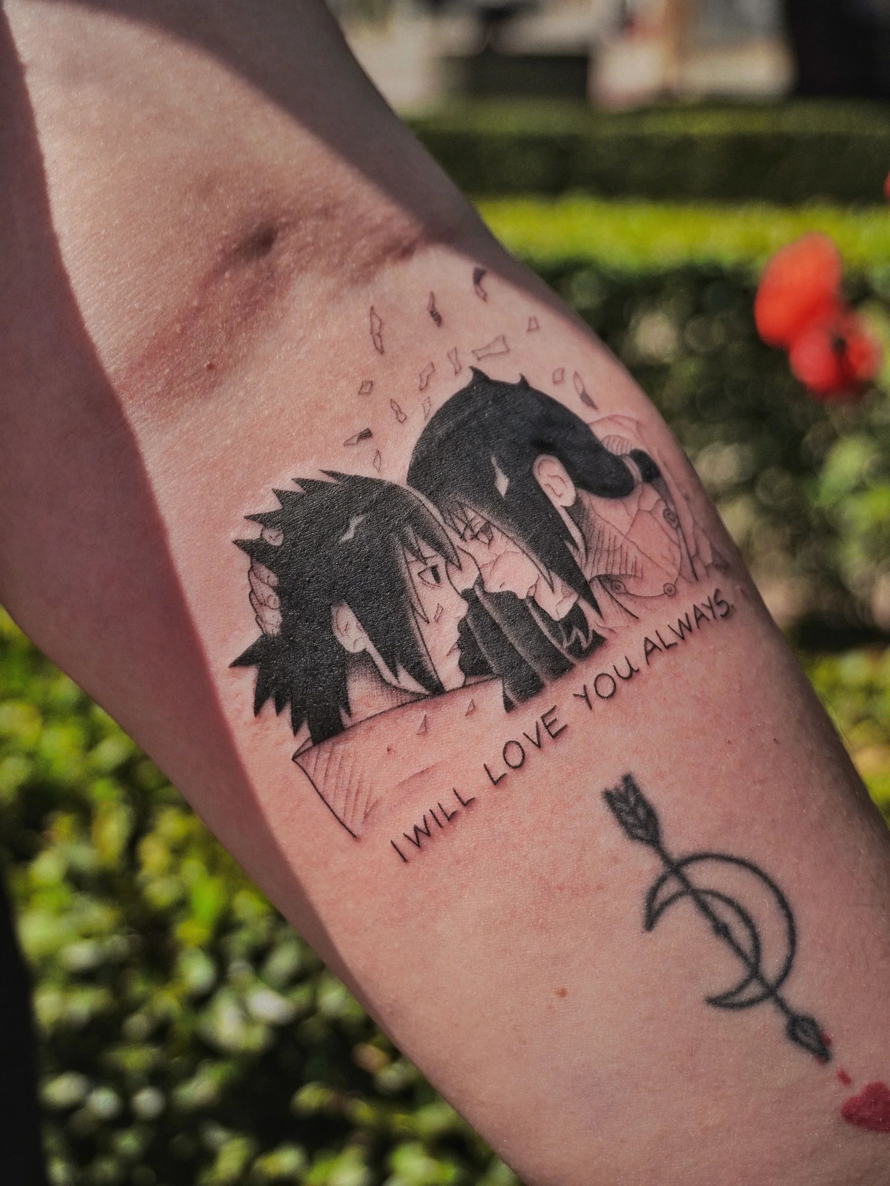 Itachi and Sasuke with the words I will love you always, on the forearm