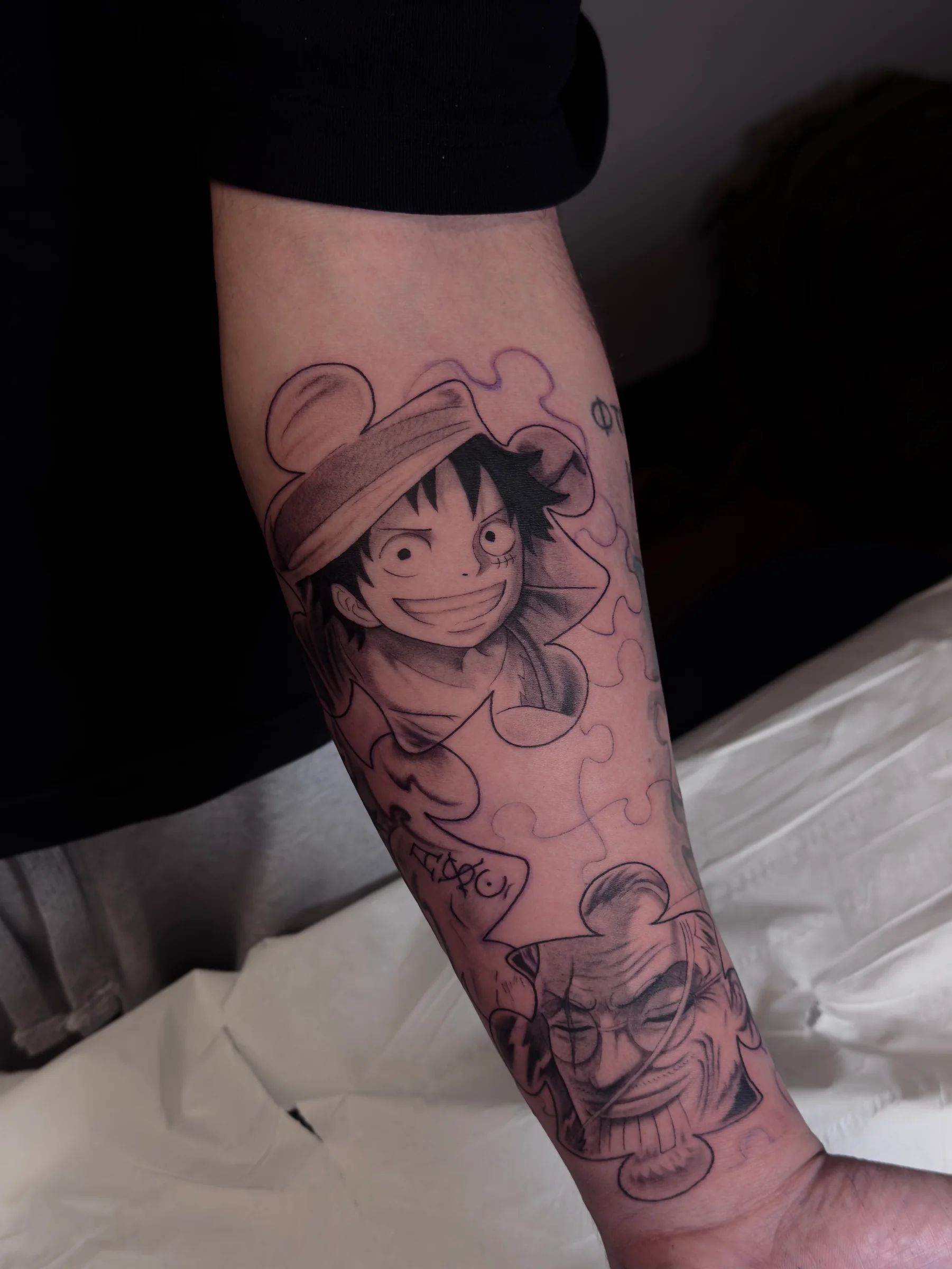 Luffy from One Piece on the forearm